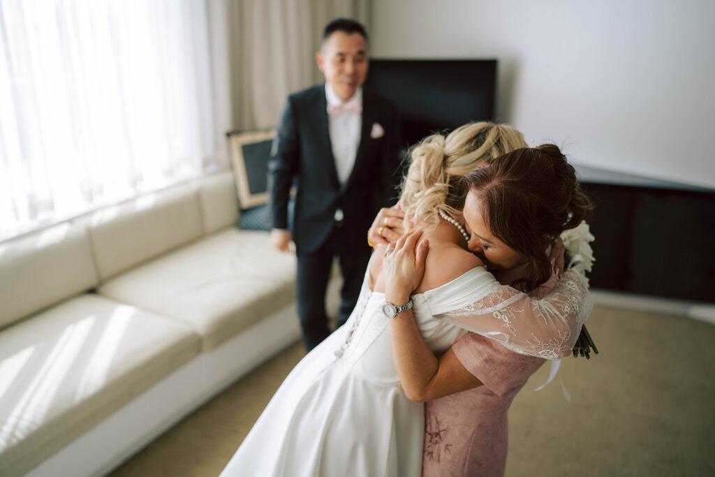 Mother and her daughter embracing a hug